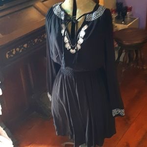 Torrid black with white smocking trim long sleeve dress.